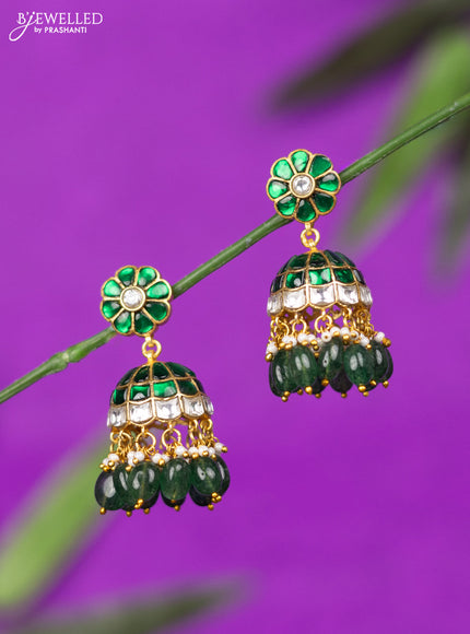 Jadau jhumka with green jadau kundan stones and green beads hangings