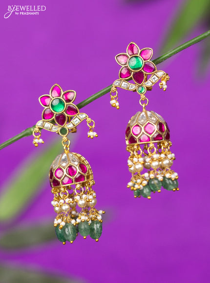 Jadau screw type jhumka with kemp jadau kundan stones and mint green beads hangings