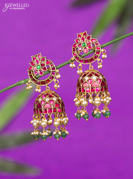 Jadau screw type jhumka with kemp jadau kundan stones and mint green beads hangings