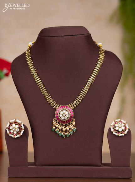 Jadau necklace with pink jadau kundan stones and pearl & mint green beads hangings