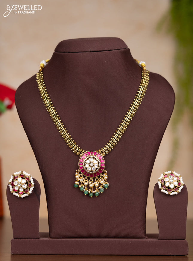Jadau necklace with pink jadau kundan stones and pearl & mint green beads hangings