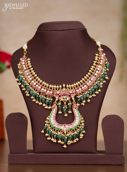 Jadau necklace with kemp jadau kundan stones and pearl & green beads hangings without earrings