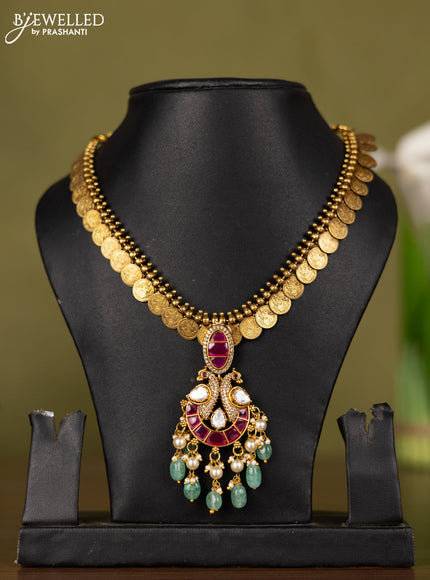 Antique kaasu necklace with lakshmi deisgn and pendant in jadau kundan stones