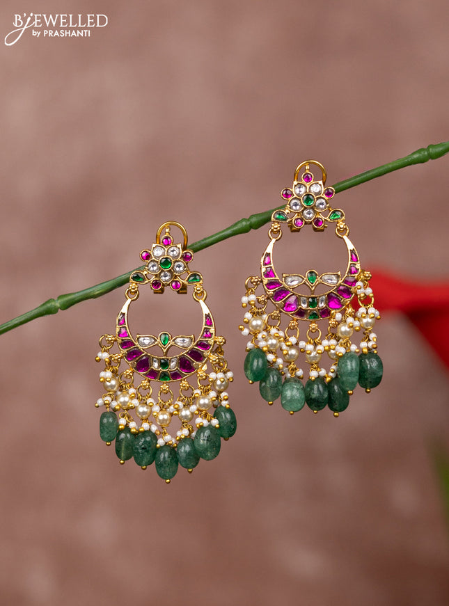 Jadau earrings floral deisgn with jadau kundan stones and green beads hanging