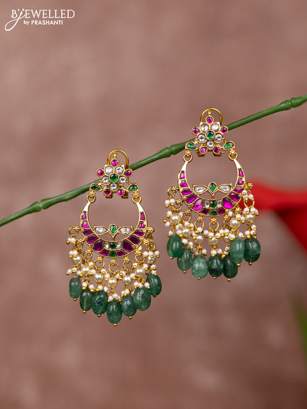 Jadau earrings floral deisgn with jadau kundan stones and green beads hanging