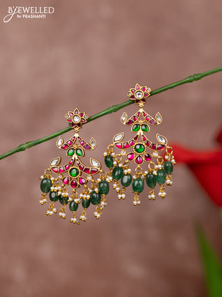 Jadau earrings floral deisgn with jadau kundan stones and green beads hanging