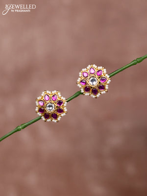 Jadau earrings floral deisgn with jadau kundan stones surrounded with white beads
