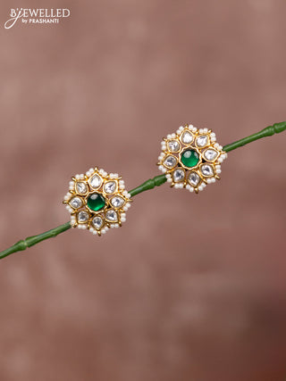 Jadau earrings floral deisgn with kundan stones surrounded with white beads