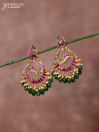 Jadau earrings peacock deisgn with jadau kundan stones and green beads hanging