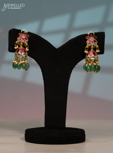 Jadau screw type jhumka with kemp jadau kundan stones in mint green beads hangings