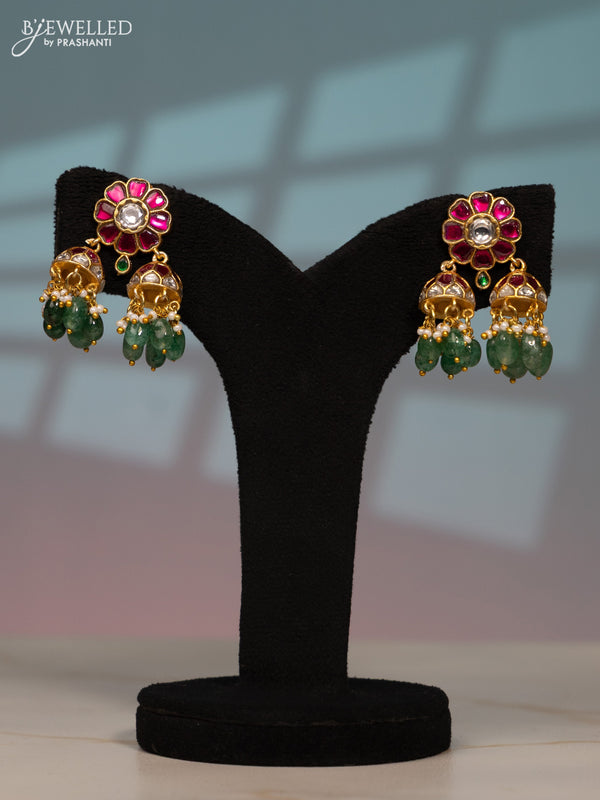 Jadau screw type jhumka with kemp jadau kundan stones in mint green beads hangings