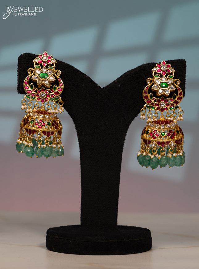 Jadau screw type jhumka with kemp jadau kundan stones in mint green beads hangings