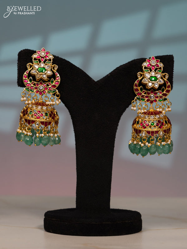Jadau screw type jhumka with kemp jadau kundan stones in mint green beads hangings
