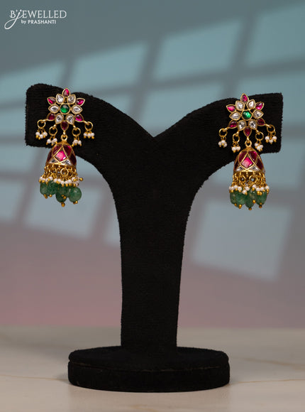 Jadau screw type jhumka with kemp jadau kundan stones in mint green beads hangings