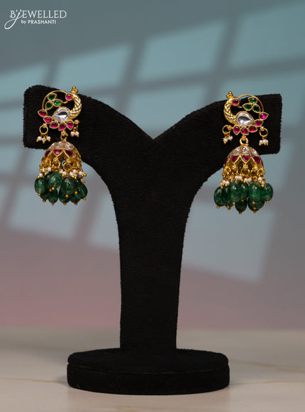 Jadau screw type jhumka peacock design with kemp jadau kundan stones in green beads hangings