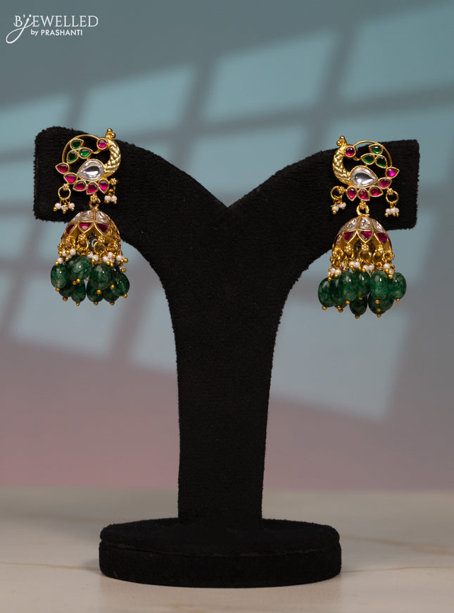 Jadau screw type jhumka peacock design with kemp jadau kundan stones in green beads hangings