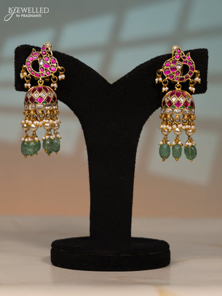 Jadau screw type jhumka peacock design with kemp jadau kundan stones in pearl & mint green beads hangings