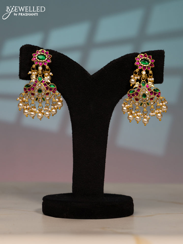 Jadau screw type earring peacock design with kemp jadau kundan stones in pearl hangings