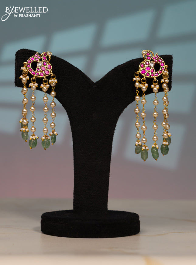 Jadau screw type earring peacock design with kemp jadau kundan stones in pearl & mint green beads hangings