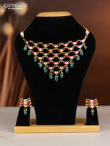 Jadau necklace moon design with pink jadau kundan stones in green beads hangings