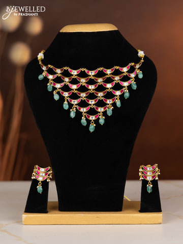 Jadau necklace moon design with pink jadau kundan stones in mint green beads hangings