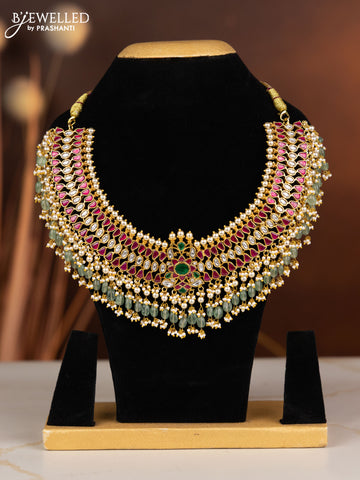 Jadau necklace with kemp jadau kundan stones in pearl & mint green beads hangings