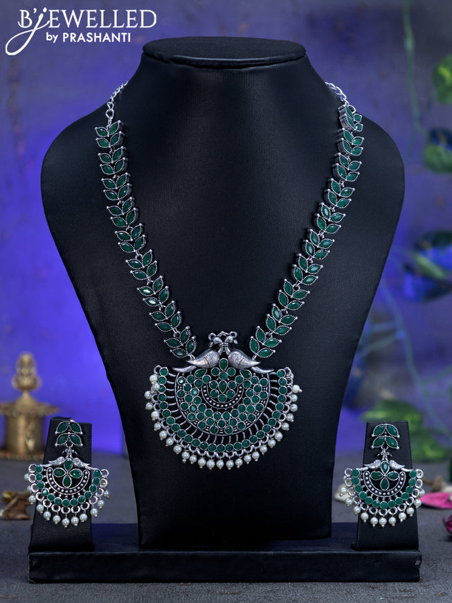 Oxidised necklace peacock & leaf design with emerald stones and pearl hangings