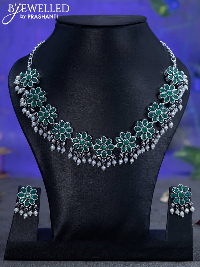 Oxidised necklace floral design with emerald stones and pearl hangings