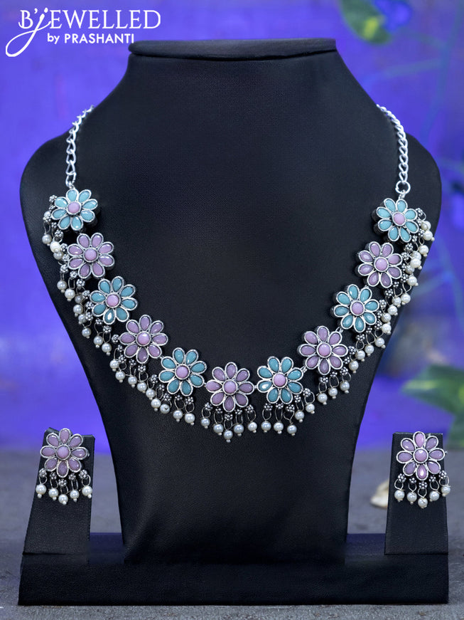Oxidised necklace floral design with baby pink & ice blue stones and pearl hangings