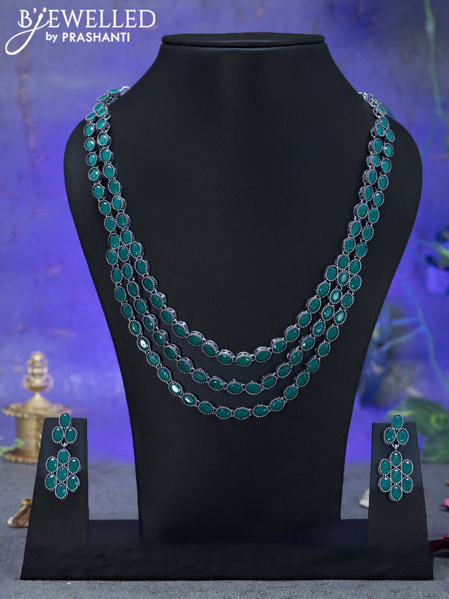 Oxidised triple layer necklace with emerald stones
