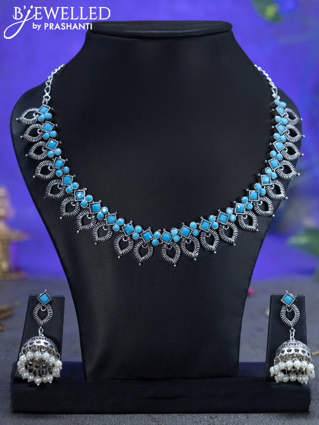 Oxidised necklace with light blue stones