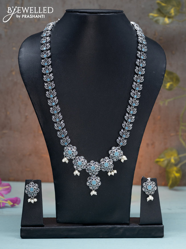 Oxidised haaram floral design with ice blue stones and pearl hangings