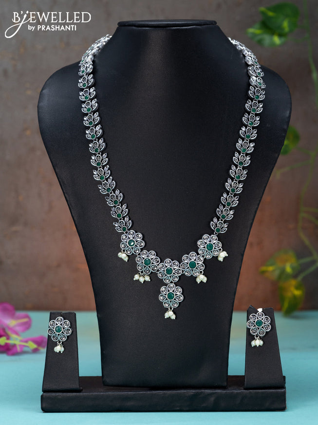 Oxidised haaram floral design with emerald stones and pearl hangings