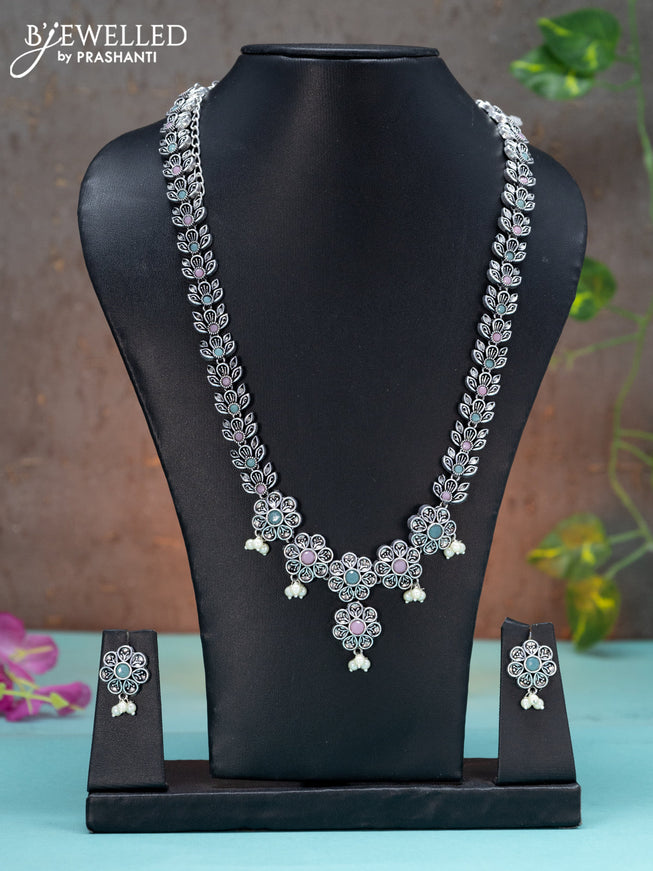 Oxidised haaram floral design with mint green & baby pink stones and pearl hangings