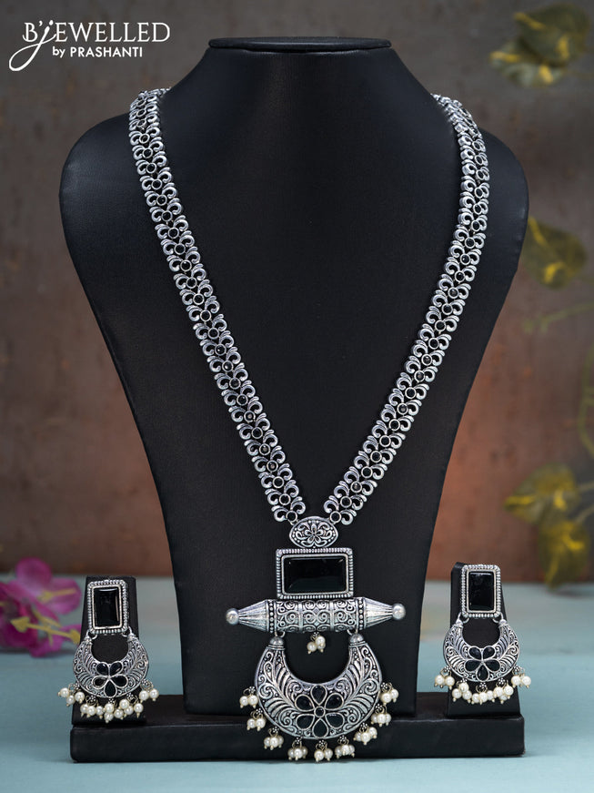 Oxidised long haaram floral design with black stones and pearl hangings
