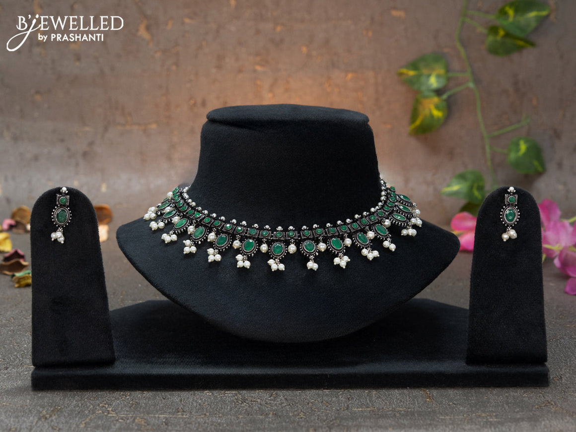 Oxidised necklace with emerald stones and pearl hangings