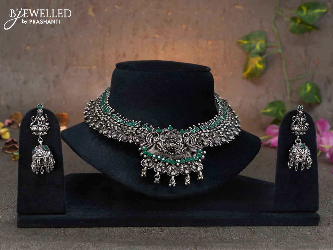 Oxidised necklace lakshmi design with emerald stones and hangings