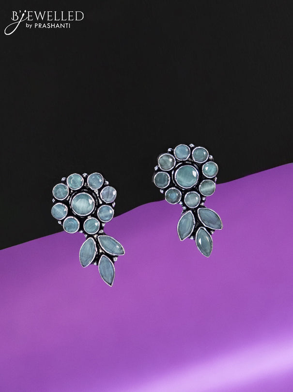 Oxidised earrings with mint green stones