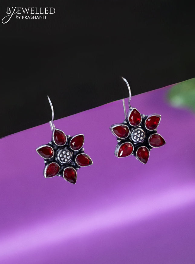 Oxidised hanging type earring floral design with maroon stones