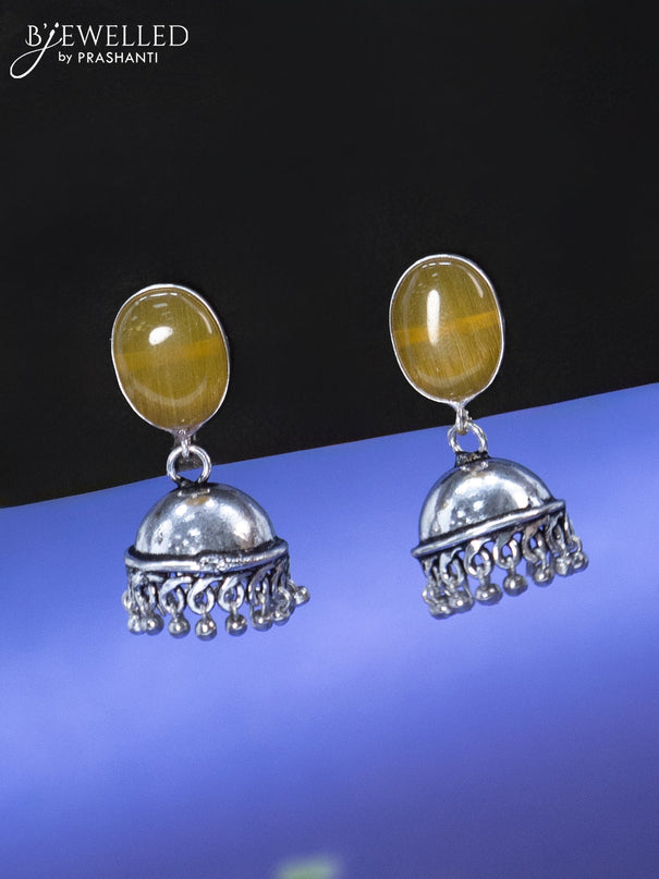 Oxidised jhumka with yellow stone and hangings