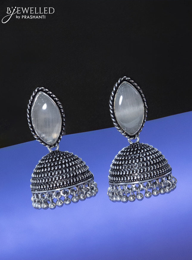 Oxidised jhumka with off white stone and hangings