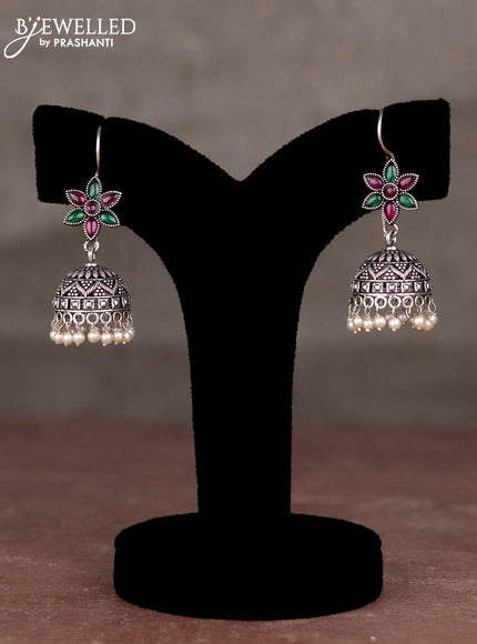 Oxidised hanging type jhumka with kemp stones and pearl hangings
