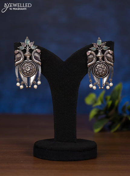 Oxidised earring with mint green & baby pink stones and pearl hangings