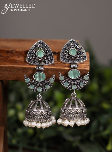 Oxidised jhumka with mint green stones and pearl hangings