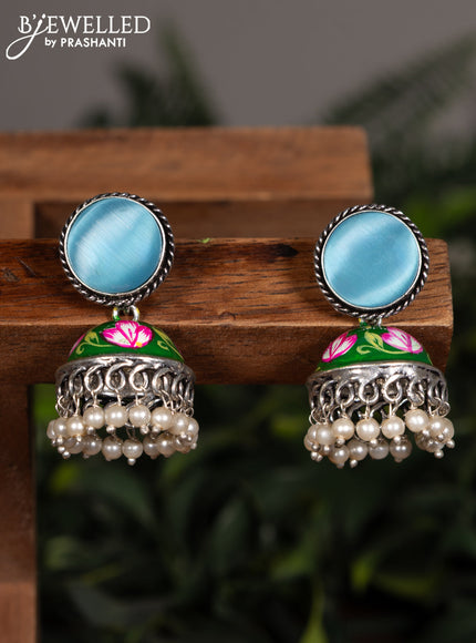 Oxidised minakari green jhumka with ice blue stones and pearl hangings