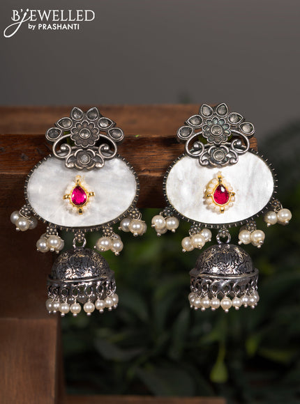 Oxidised jhumka with mint green & ruby stones and pearl hangings