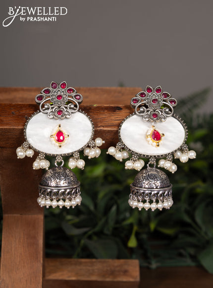 Oxidised jhumka with ruby stones and pearl hangings