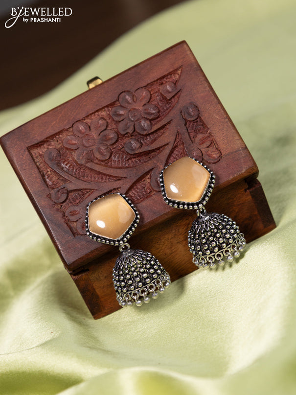 Oxidised jhumka with peach stone and hangings