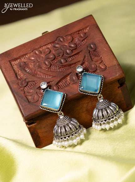 Oxidised jhumka with ice blue & cz stones and pearl hangings