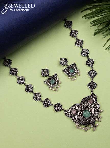 Oxidised haaram with mint green & baby pink stones and pearl hangings